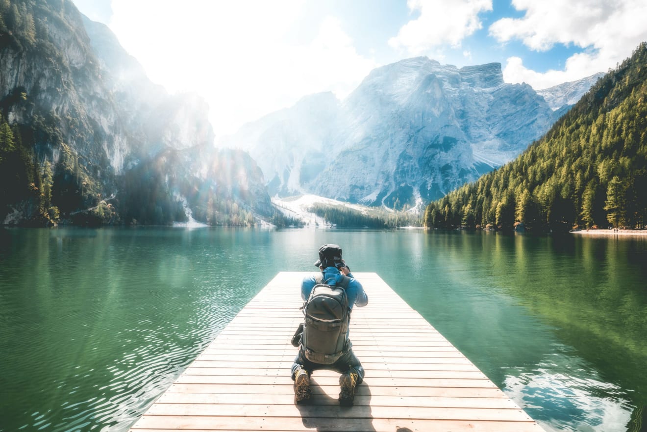 Traveler Taking Photo Of Lake Braies In Italy.