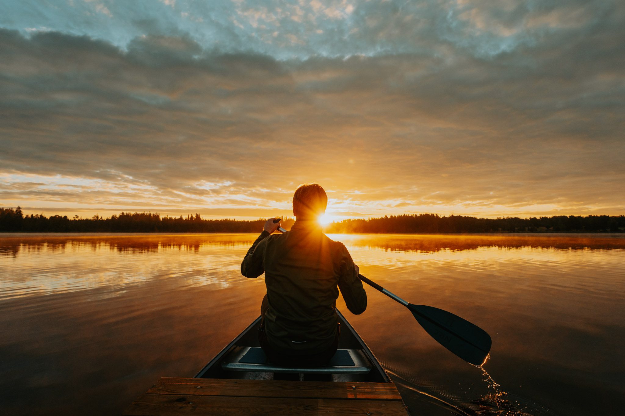 Nordic Woods sunrise canoe expeditie