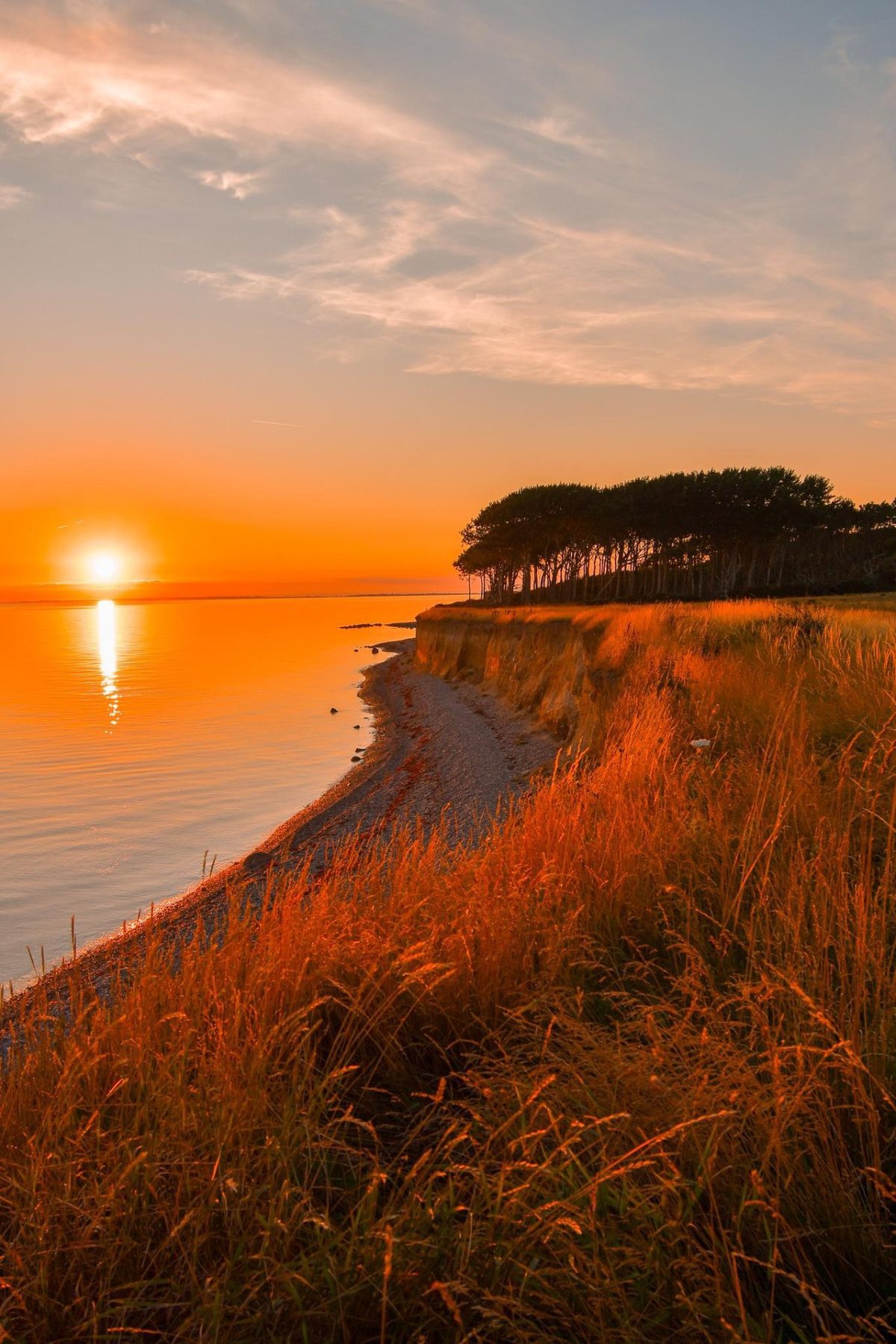 zonsondergang op het eiland Langeland, Denemarken - Archipelago Trail